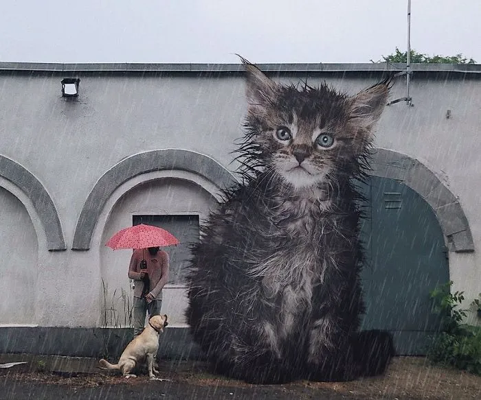 Este artista crea imágenes mostrando cómo sería el mundo si los gatos fueran mucho más grandes (30 imágenes)