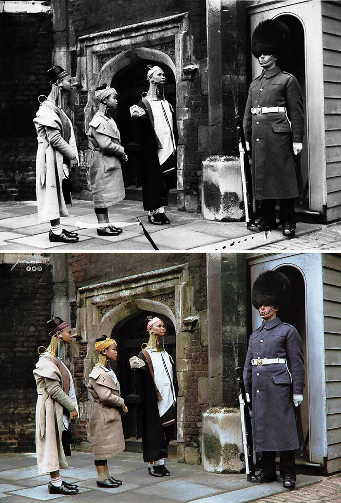 Mujeres jirafa mirando a un guardia, apostado en la puerta principal del siglo XVI del Palacio de St. James, durante su visita a Londres, 1935
