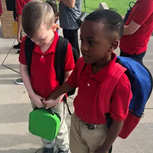 This 8 Y.O. Boy Saw An Autistic Boy Crying On The First Day Of School, Grabbed His Hand And Walked Him To Class