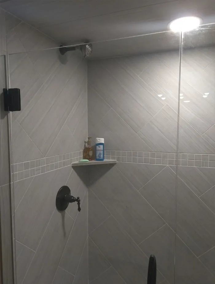 My Mom Had Her Guest Bathroom Remodeled While She Was Out Of Town. She Wanted The Shower Head Up High So Tall People Didn't Have To Crouch Or Lean Way Back. Came Home To Find This, Which Shoots The Water Straight Across To The Opposite Wall