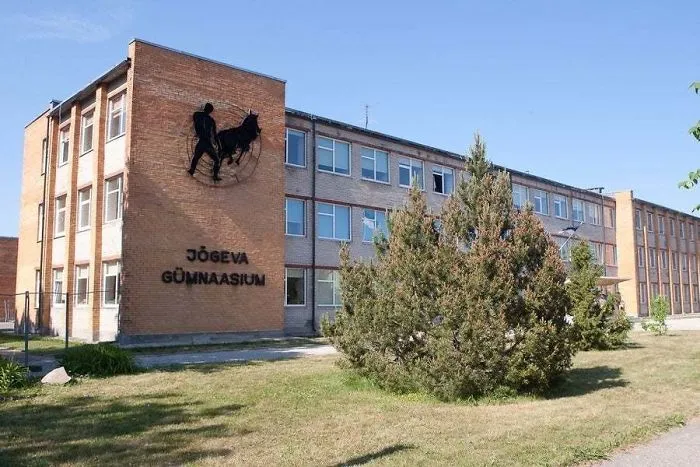 "A Man Plowing A Field" On A Local School Building