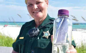 Family Puts Ashes Of Their Beloved Son And A Letter In A Bottle With $4 Bills And Throws It Into The Sea, This Woman Finds It