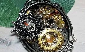 Artist In The Ozarks Turns Old Watch Parts Into Halloween Jewelry