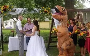 Maid Of Honor Crashes Her Sister's Wedding Dressed Up As A T-Rex
