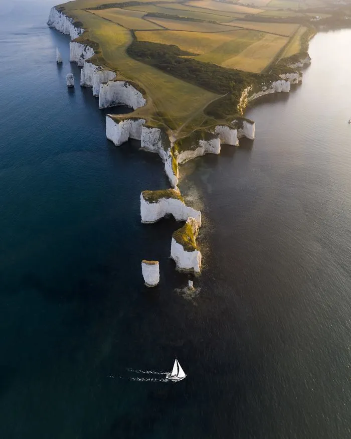 Boat Cruising Past Old Harry Rocks, Dorset, Joe Shelly, UK