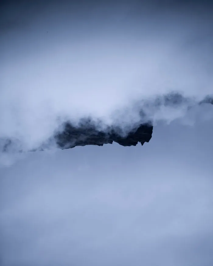 Mountain Peaks In The Clouds
