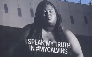 Woman Shames Calvin Klein's Plus-Size Rapper Billboard, She Responds And Starts A Heated Discussion