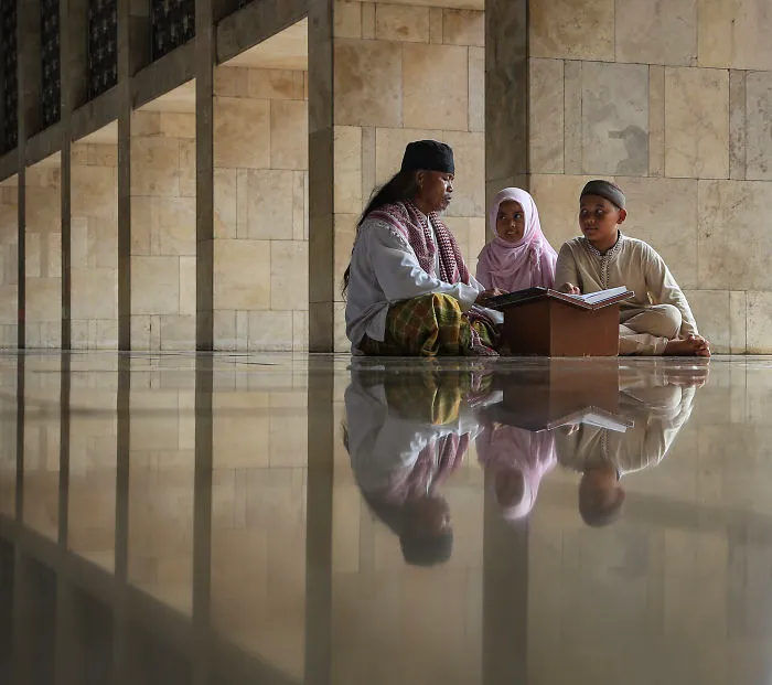 Reading Holy Qur’an