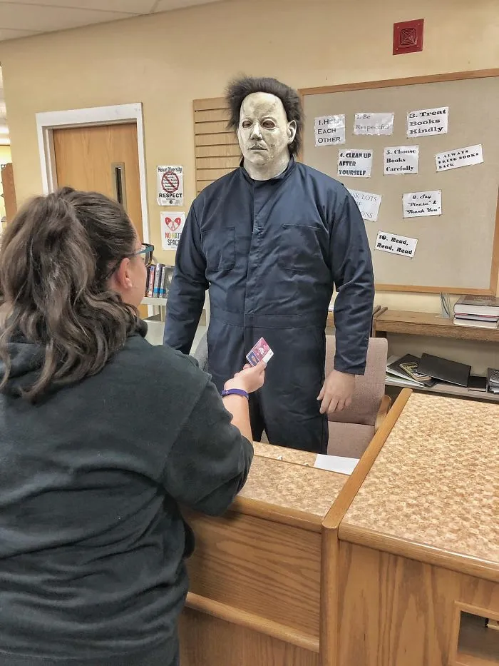 She’s Asking To Check Out A Book, Michael... And She Has Her Student Id. It’s Ok. Give Her The Book.