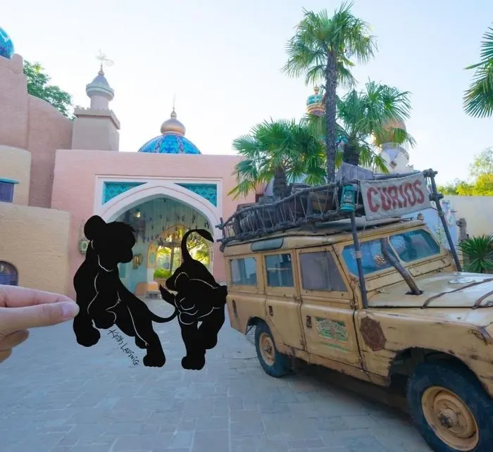 I Travel Around Disneylands Around The World To Hold Up Paper Cut-Outs Of Famous Characters And Scenes (86 Pics)