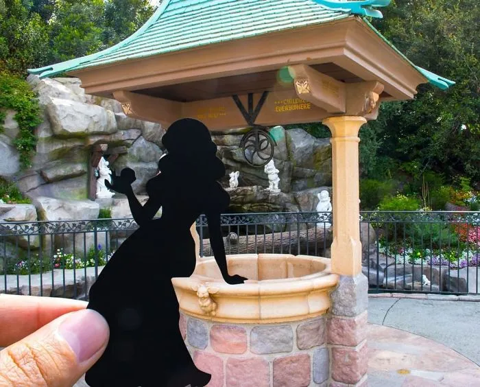 I Travel Around Disneylands Around The World To Hold Up Paper Cut-Outs Of Famous Characters And Scenes (86 Pics)