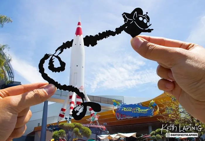 I Travel Around Disneylands Around The World To Hold Up Paper Cut-Outs Of Famous Characters And Scenes (86 Pics)