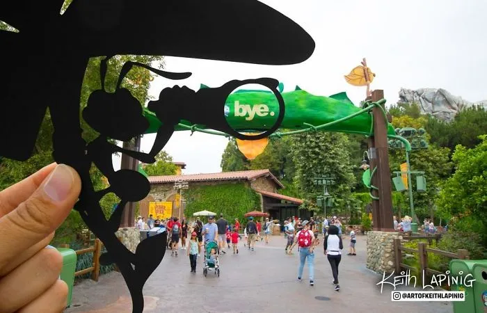 I Travel Around Disneylands Around The World To Hold Up Paper Cut-Outs Of Famous Characters And Scenes (86 Pics)