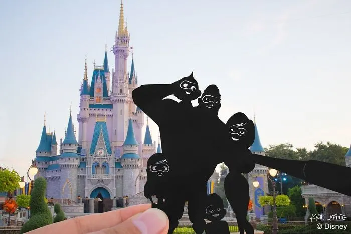 I Travel Around Disneylands Around The World To Hold Up Paper Cut-Outs Of Famous Characters And Scenes (86 Pics)