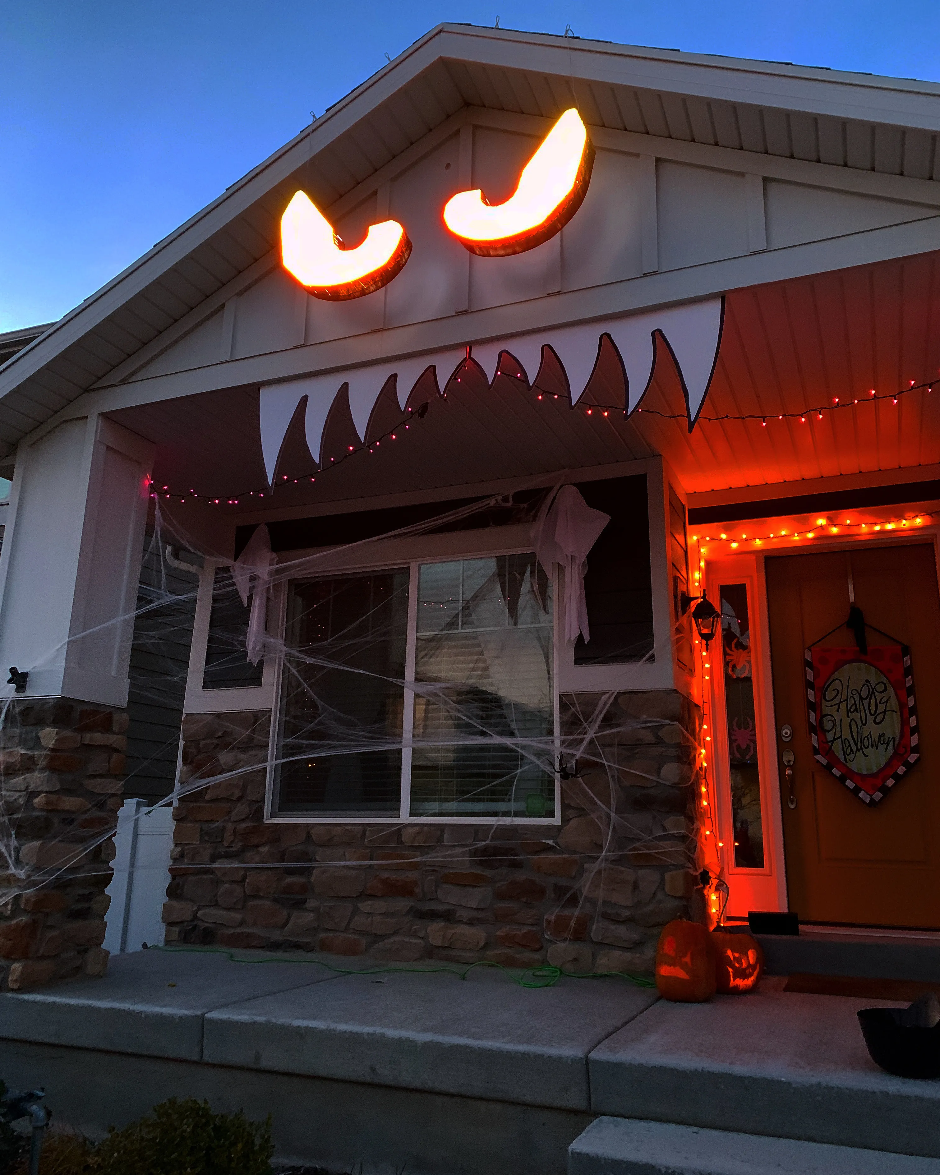 Monster House With Glowing Eyes Halloween Decoration.