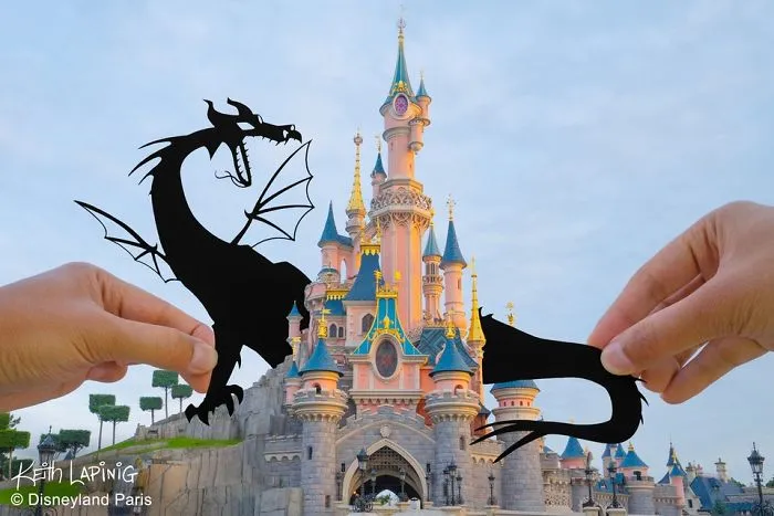 I Travel Around Disneylands Around The World To Hold Up Paper Cut-Outs Of Famous Characters And Scenes (86 Pics)
