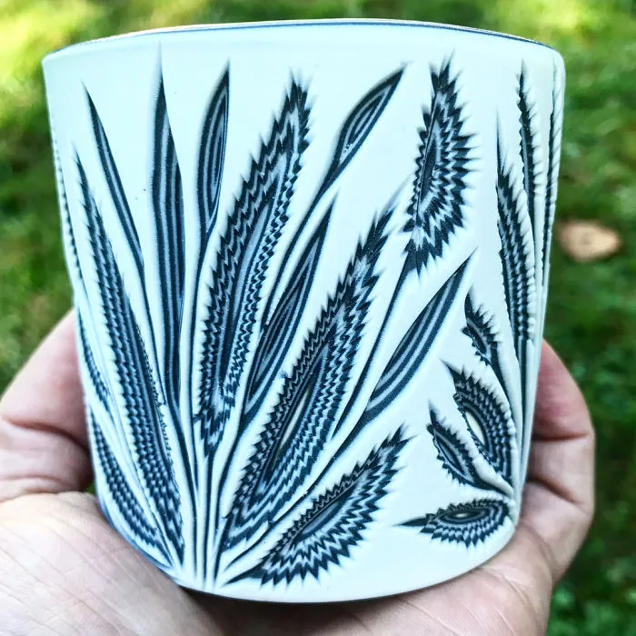 This Artist Carves Pottery And Reveals Unexpected Layers Of Colors Underneath
