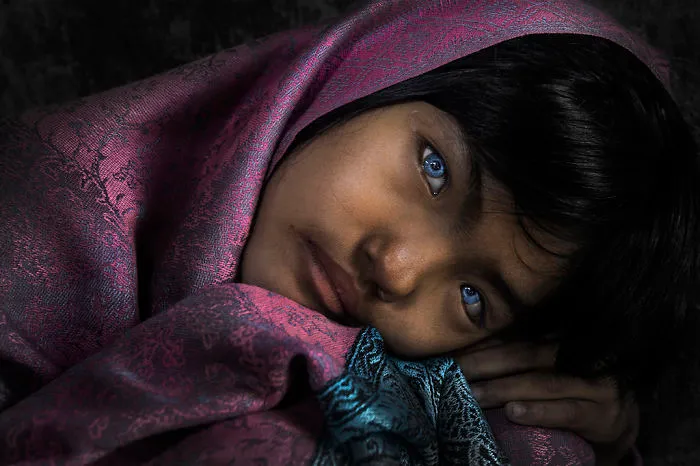 Little Girl With Blue Eyes