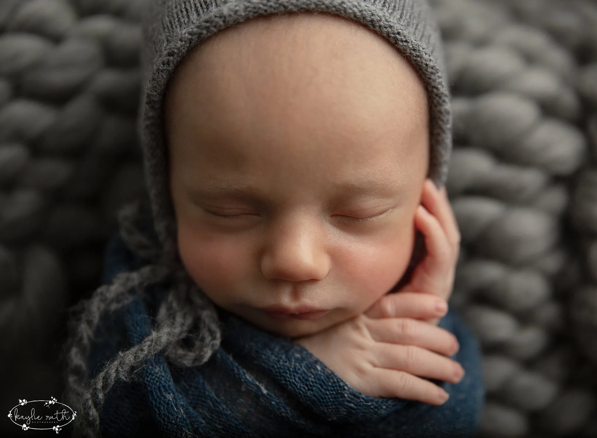 Sleepy Baby Boy In A Bonnet