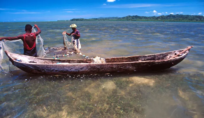 Fishermen In A Lagoon