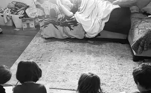 Dad Watches Kids & Lets Mom Go Shopping, Mom Returns To Him Sleeping While His Kids Draw Him “Posing”