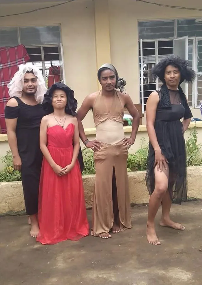 30 Divertidas fotos de filipinos vestidos con "inadecuada" ropa donada en centros de evacuación por el volcán