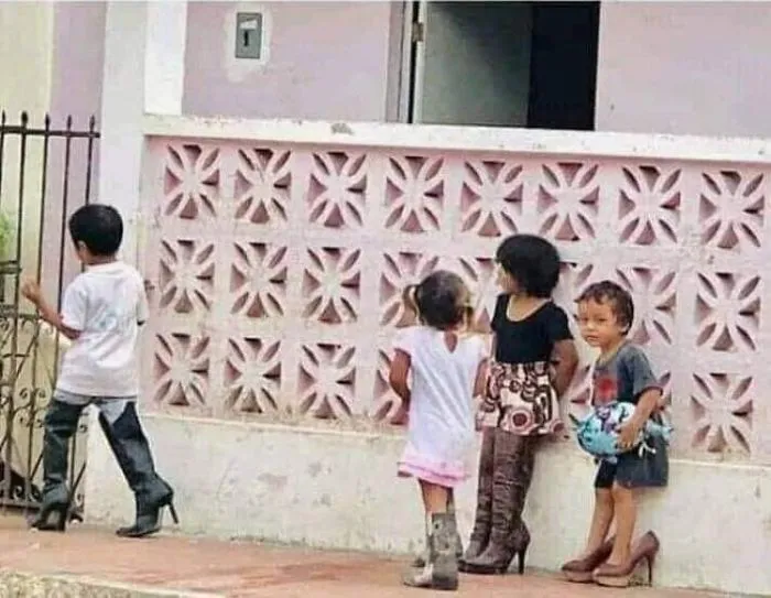 30 Divertidas fotos de filipinos vestidos con "inadecuada" ropa donada en centros de evacuación por el volcán