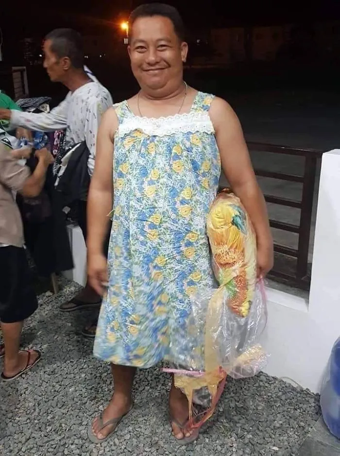 30 Funny Pics Of Filipinos Dressed Up In 'Unsuitable' Donated Clothes At A Volcano Evacuation Center