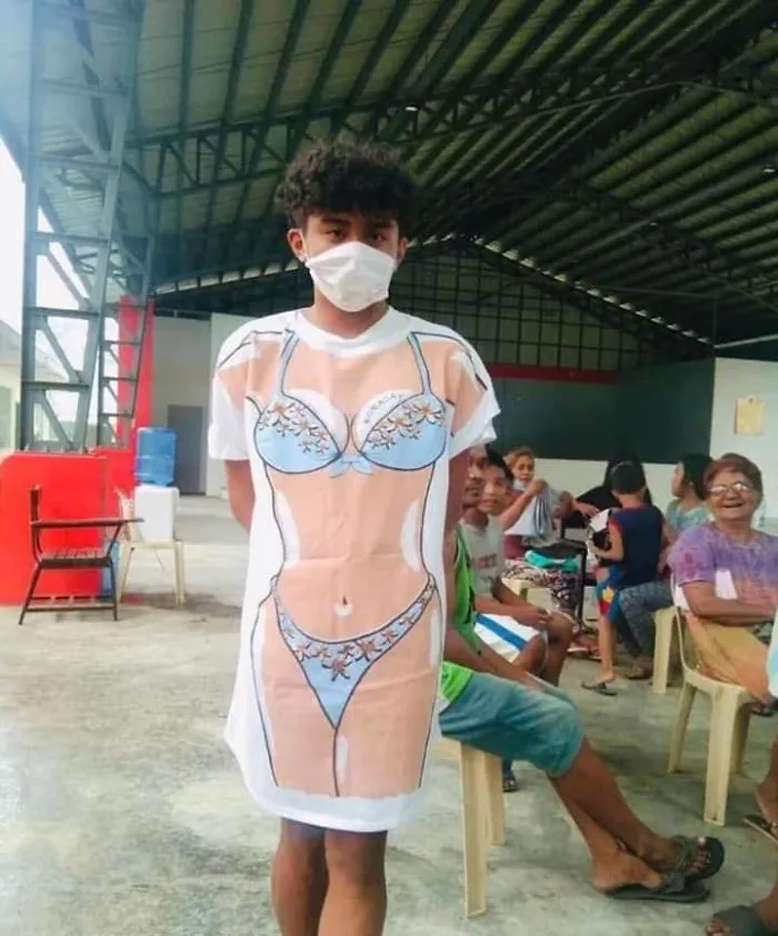 30 Divertidas fotos de filipinos vestidos con "inadecuada" ropa donada en centros de evacuación por el volcán