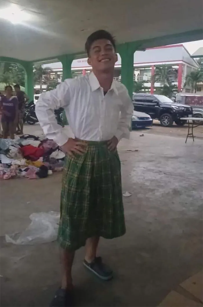 30 Funny Pics Of Filipinos Dressed Up In 'Unsuitable' Donated Clothes At A Volcano Evacuation Center