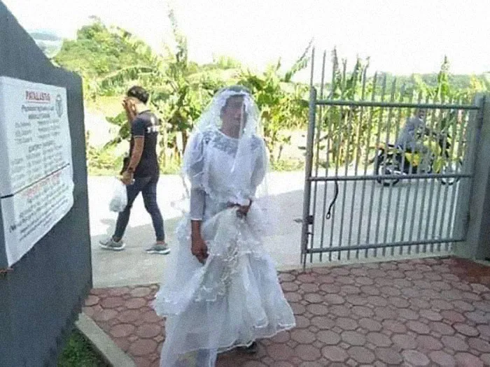 30 Divertidas fotos de filipinos vestidos con "inadecuada" ropa donada en centros de evacuación por el volcán