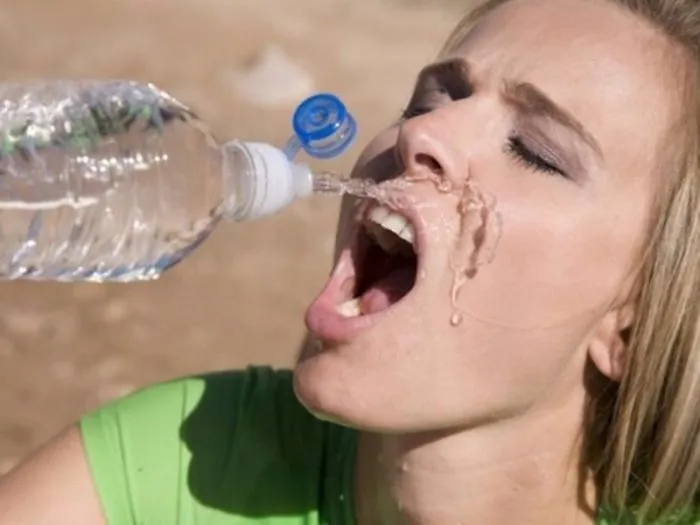 People Are Laughing At These Ridiculous Stock Images That Show Women Completely Unable To Drink Water