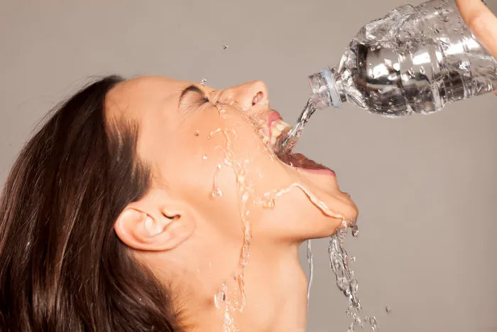 People Are Laughing At These Ridiculous Stock Images That Show Women Completely Unable To Drink Water