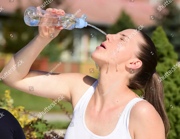 People Are Laughing At These Ridiculous Stock Images That Show Women Completely Unable To Drink Water