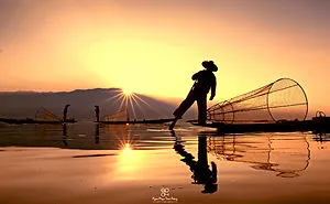 The Fishermen From Inle Lake , Most Magical Travel Photography By Pyae Phyo Thet Paing