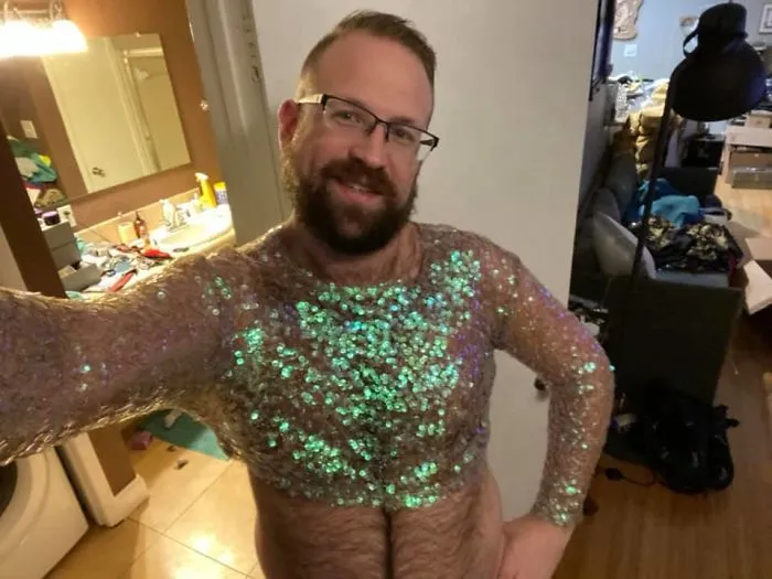 Someone Might Ask Themselves While Browsing The Racks At Goodwill, “Who Would Wear A Long Sleeve Iridescent Sequin Crop Top?” Well The Answer Is This Sparkle Bear