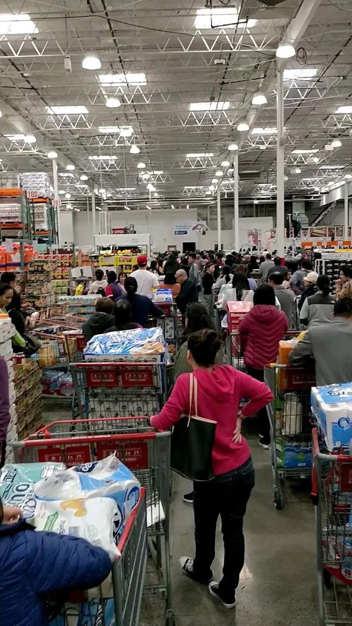 Today's Line As Soon As Costco Opened. People Fighting For Water, Toilet Paper, Rice, And Other Essentials