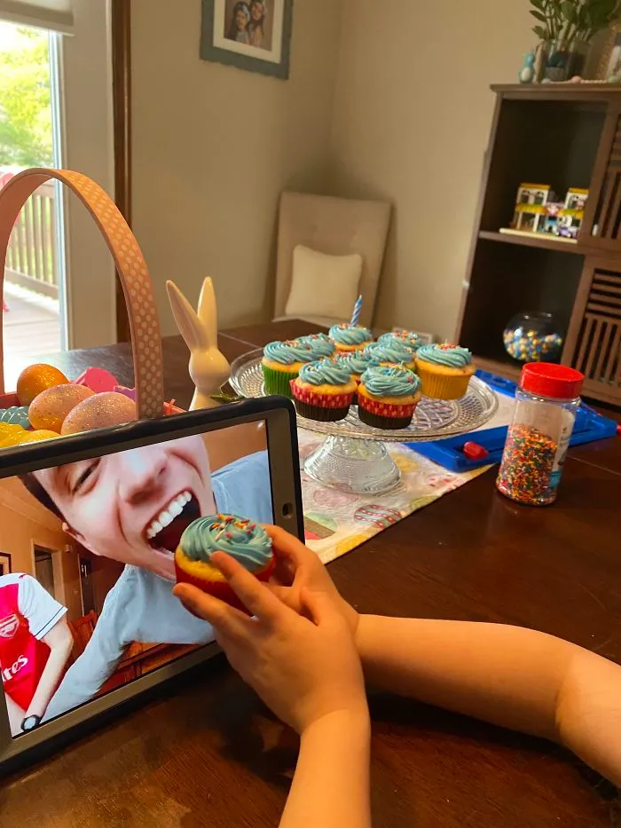 My Daughter Feeding My Brother A Cupcake During His Virtual Birthday Party
