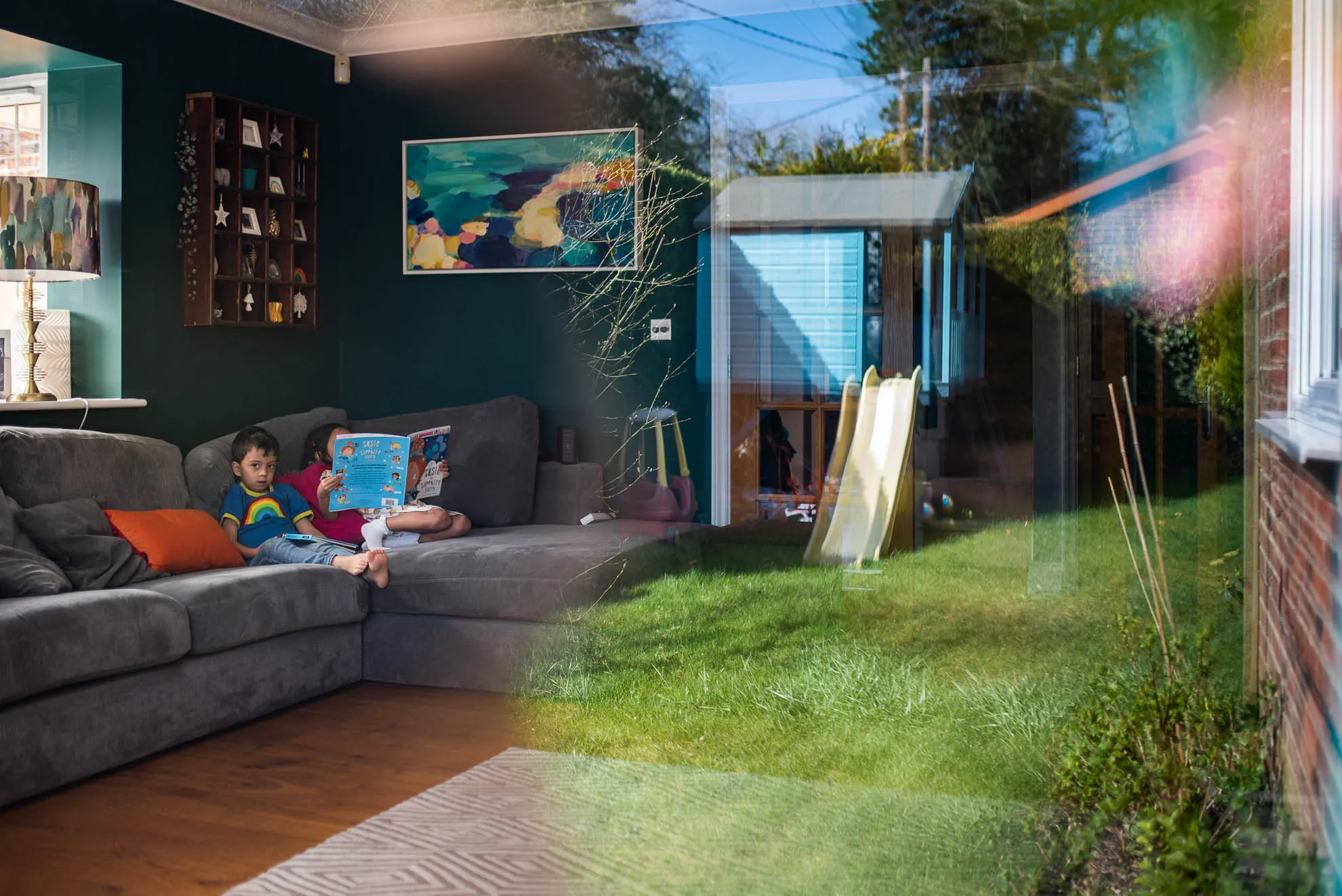I'm Photographing Family Life "Through The Rainbow Windows" During Social Distancing