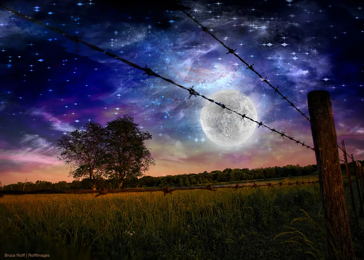 Giant Moon Over Rural Landscape