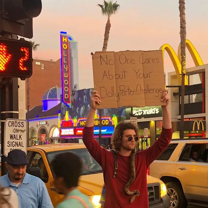 'Dude With A Sign' Has 5.7 Million Followers For Dropping Truth Bombs On Signs In Public