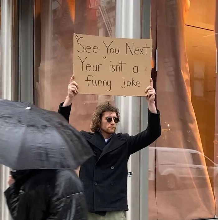 'Dude With A Sign' Has 5.7 Million Followers For Dropping Truth Bombs On Signs In Public