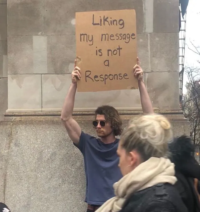 'Dude With A Sign' Has 5.7 Million Followers For Dropping Truth Bombs On Signs In Public
