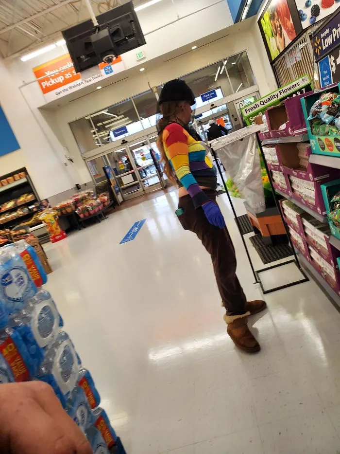 She's Wearing A Mesh Bee Keeper Type Helmet. I'm Not Sure She Gets The Point