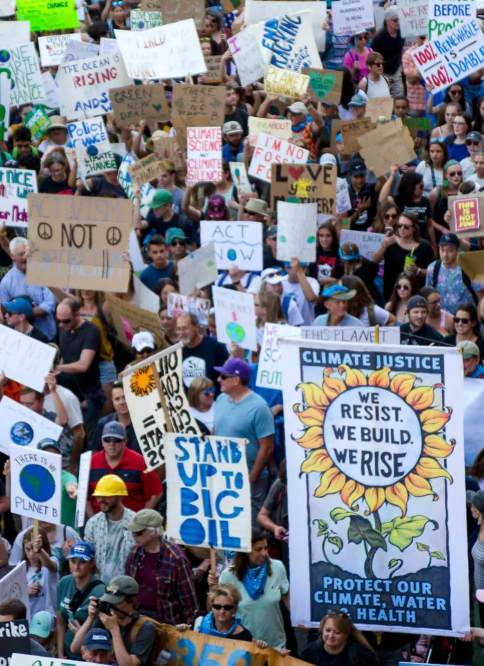 A Crowd Of Demonstrators Protesting The Government’s Inaction With Regard To Climate Change