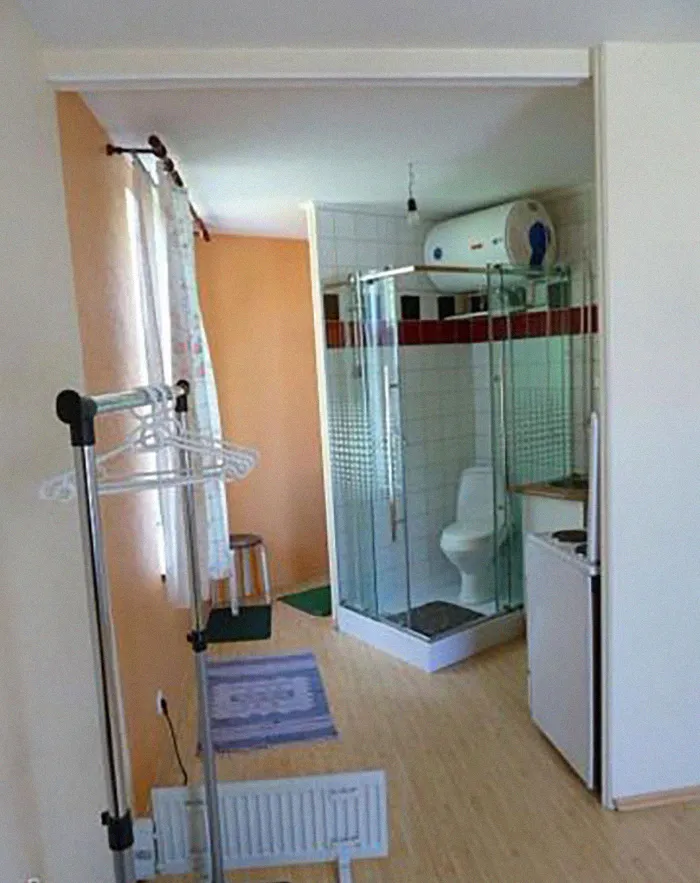 Like A Circle In A Spiral,  Like A Wheel Within A Wheel.  Like A Toilet In A Shower,  In A Kitchen, With Hanging Space For Clothes, And A Portable Radiator