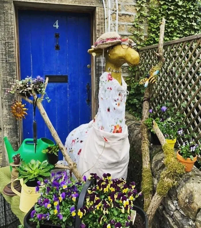 Gloria Is Busy In The Garden