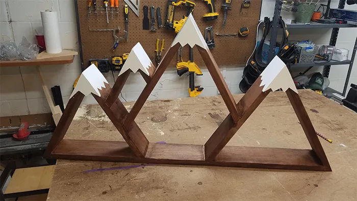 Second quarantine project, mountain shelves for my son's big boy room using simple pine board. Almost embarrassingly simply compared to the master pieces on this sub, but I'm proud of how it came out, especially the white cap