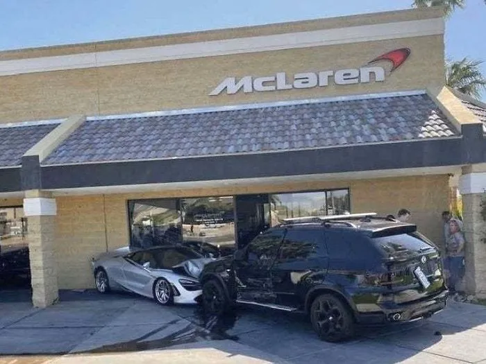 Suv Crashes Into Mclaren Dealer