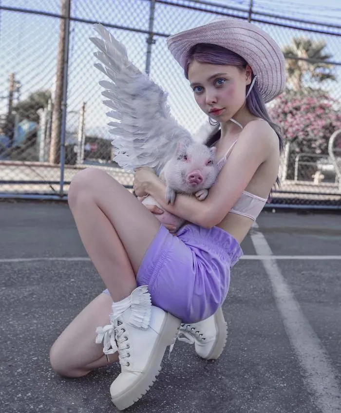 Russian Artist Gained 4.5M Followers By Taking Bizarre And Thought-Provoking Photos